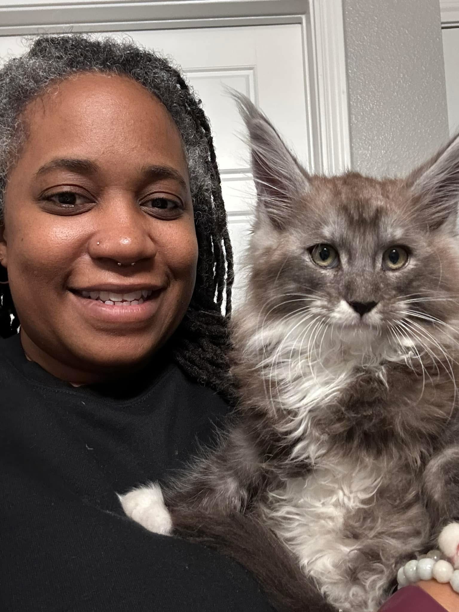 A JazzyMajestical adopter with her Maine Coon